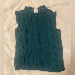 Green babydoll sleeveless blouse